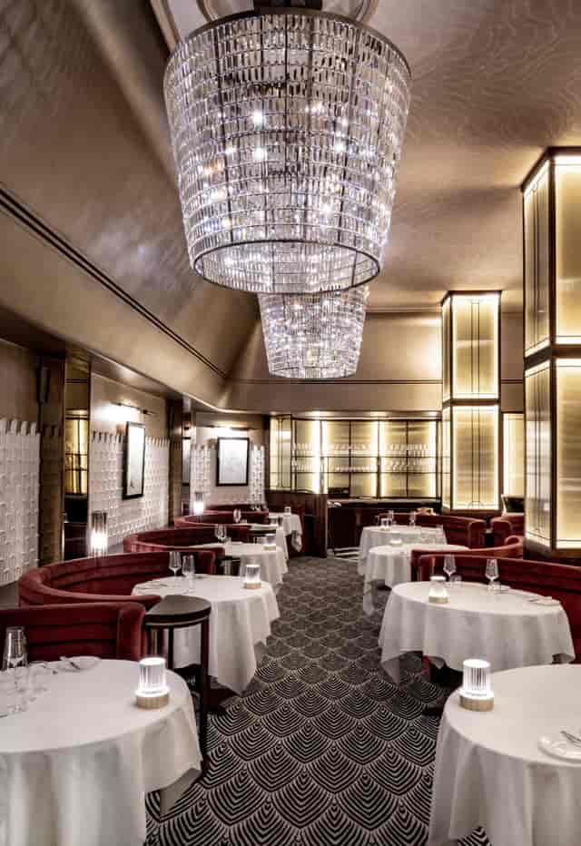 Elegant dining space at Savoy Grill, perfect for upscale events and intimate gatherings.