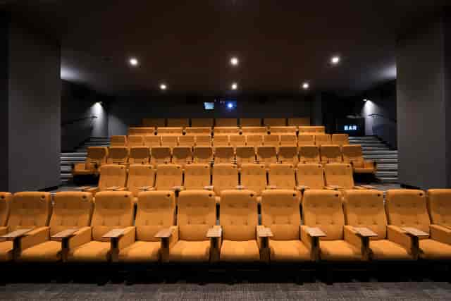 Curzon Aldgate Cinema Screen 2 with plush yellow seating for screenings and events.