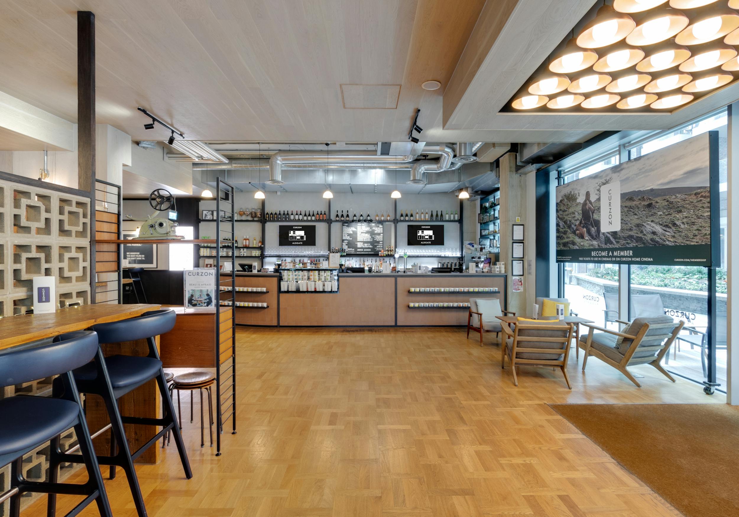 Curzon Aldgate bar area, modern event space for casual meetings and gatherings.