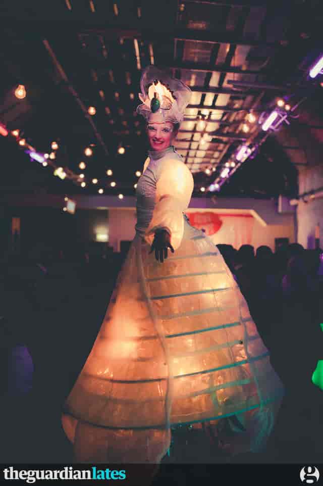 Vibrant performer in elaborate costume at engaging entertainment event in The Vaults.