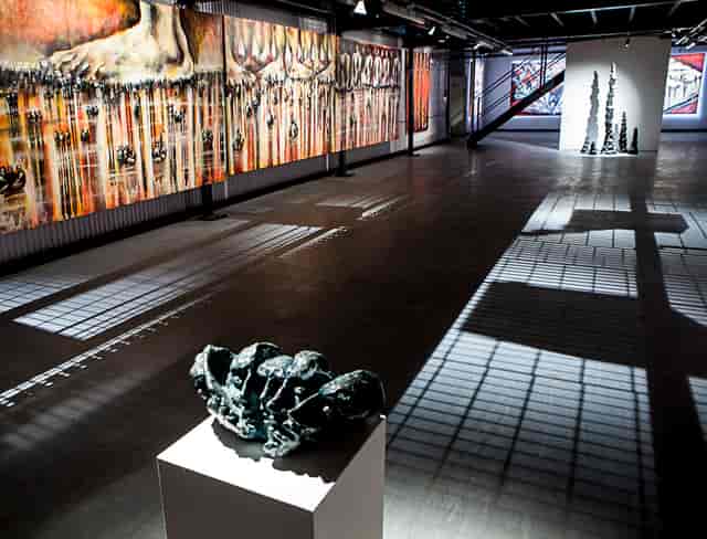 Modern gallery venue with striking artwork for art exhibitions and corporate events.
