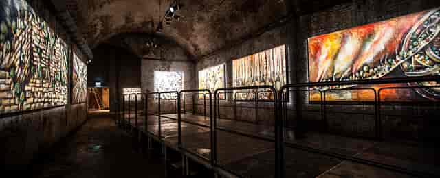 The Long Wet One venue with exposed brick, ideal for art exhibitions and corporate events.