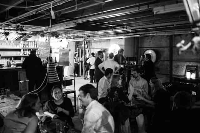 Lively networking event at The Vaults with casual seating and inviting ambiance.