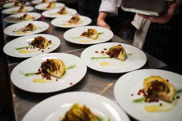 Plated dishes at The Food One in The Vaults for upscale events and dining experiences.