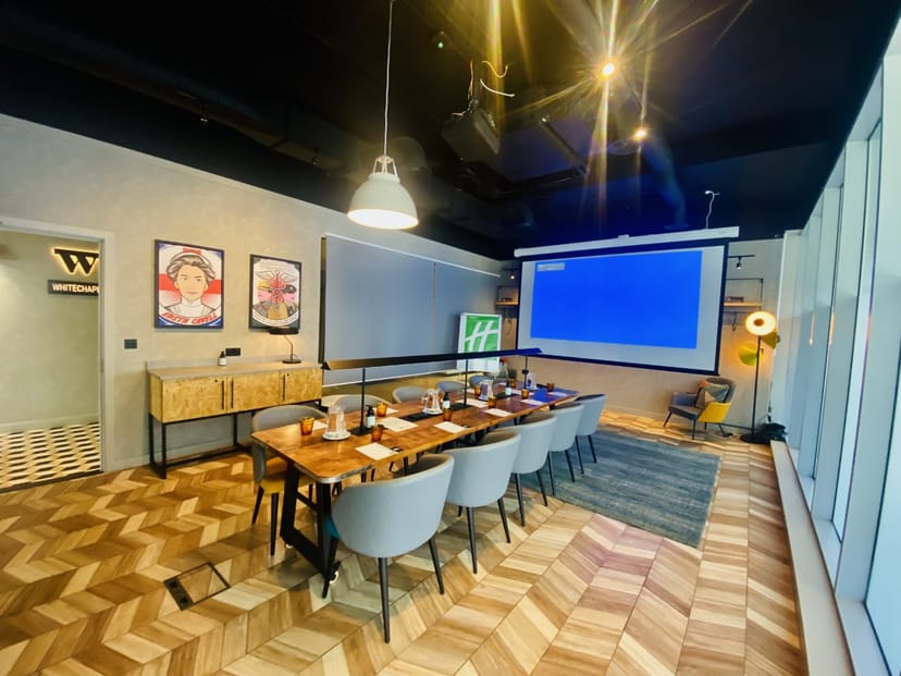 Modern meeting room at Holiday Inn Whitechapel, ideal for workshops and corporate events.