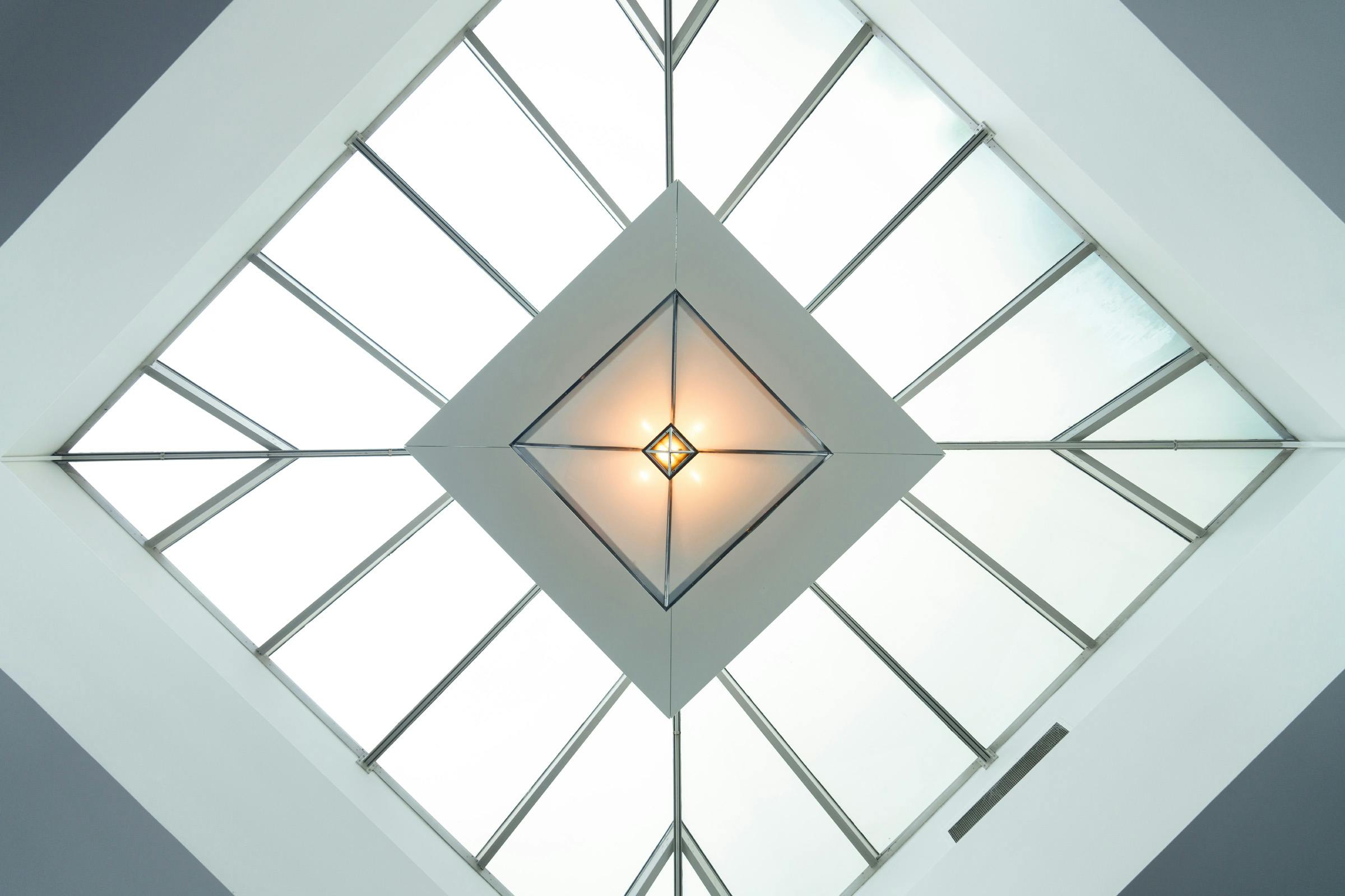 White Room at COMO Metropolitan London with skylight, ideal for events and meetings.