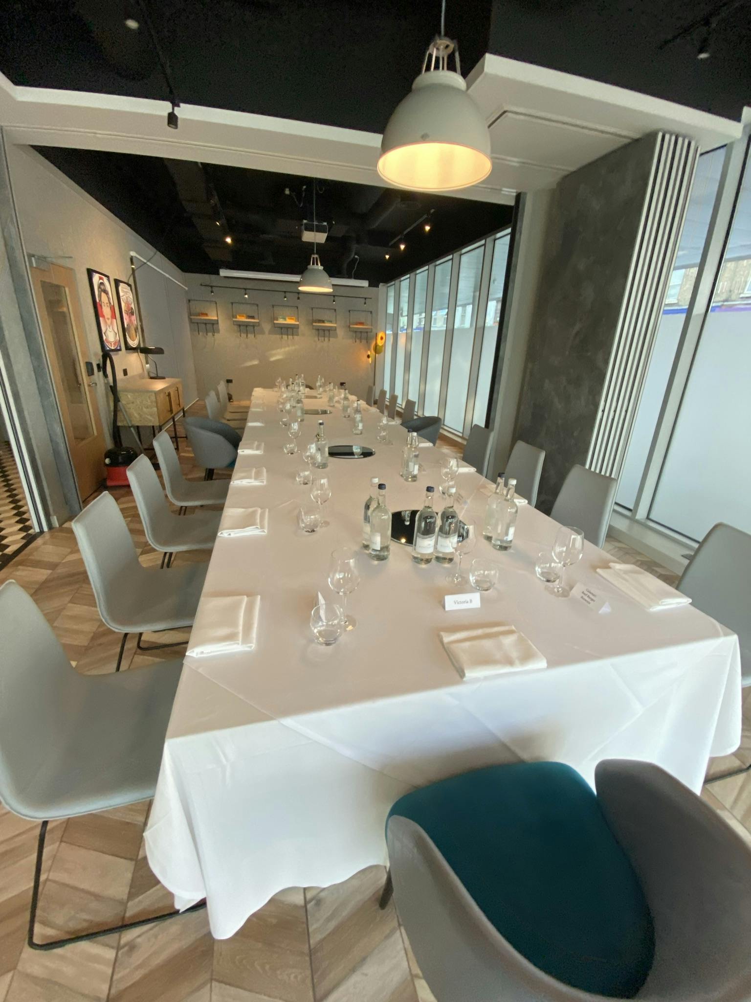 Whitechapel Think Factory meeting space with elegant table setup for corporate events.