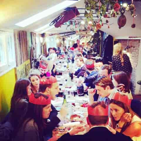 Long-table holiday party setup at The Shed Notting Hill, ideal for festive communal dining events.