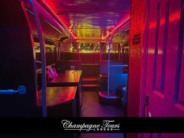 Luxury double-decker party bus interior with neon lights for events in London.