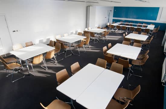 Versatile Bandura Suite meeting space with natural light, perfect for workshops and collaboration.