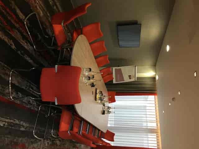 Modern meeting room in Bedford Suite, Clayton Hotel Chiswick, ideal for brainstorming sessions.