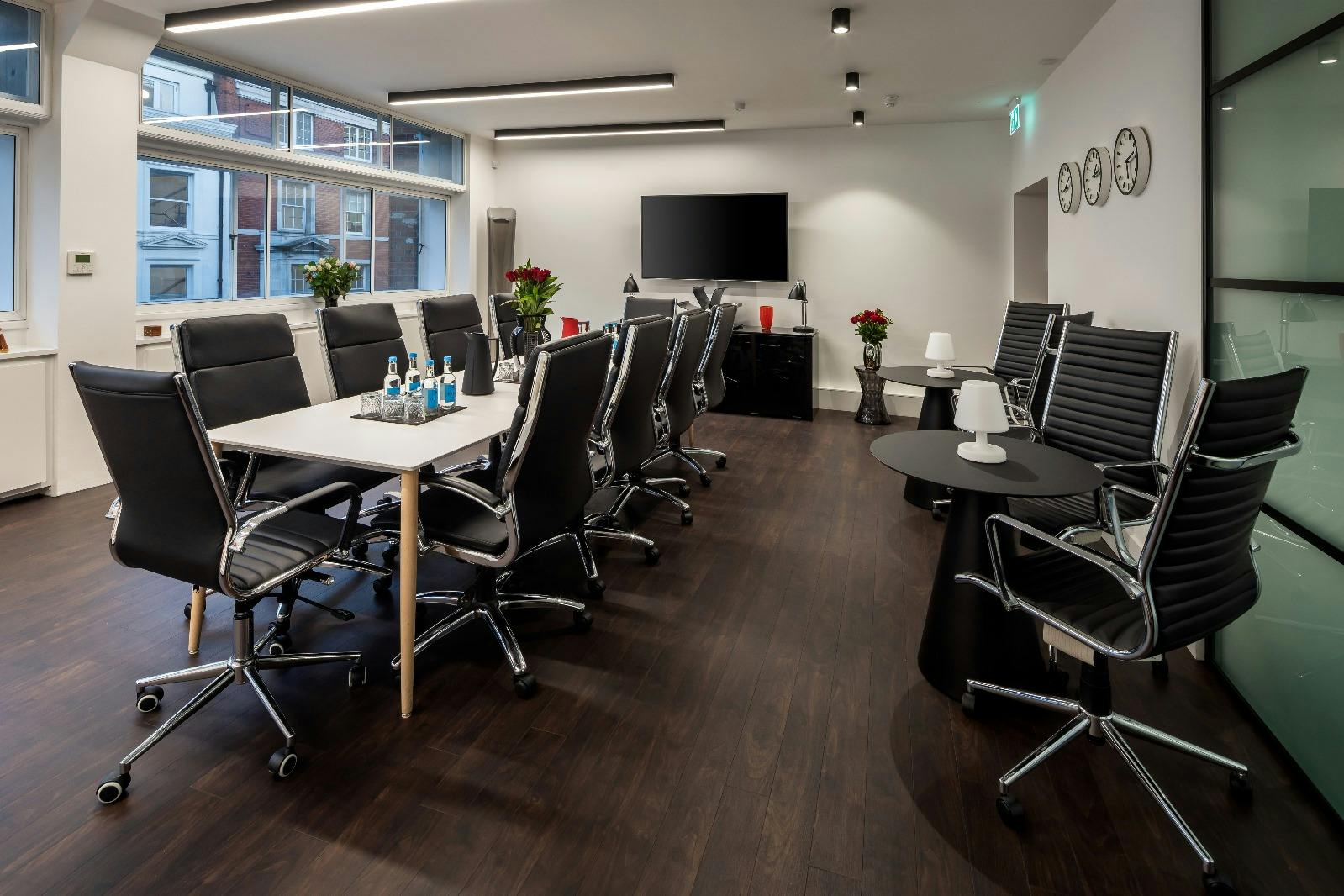 Modern meeting room in The Mayfair Room, W1 Workspace, ideal for professional events.