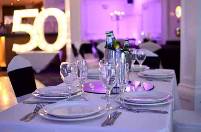 Elegant table setting for a 50th celebration at Spinnaker Function Suite, Yacht Club.
