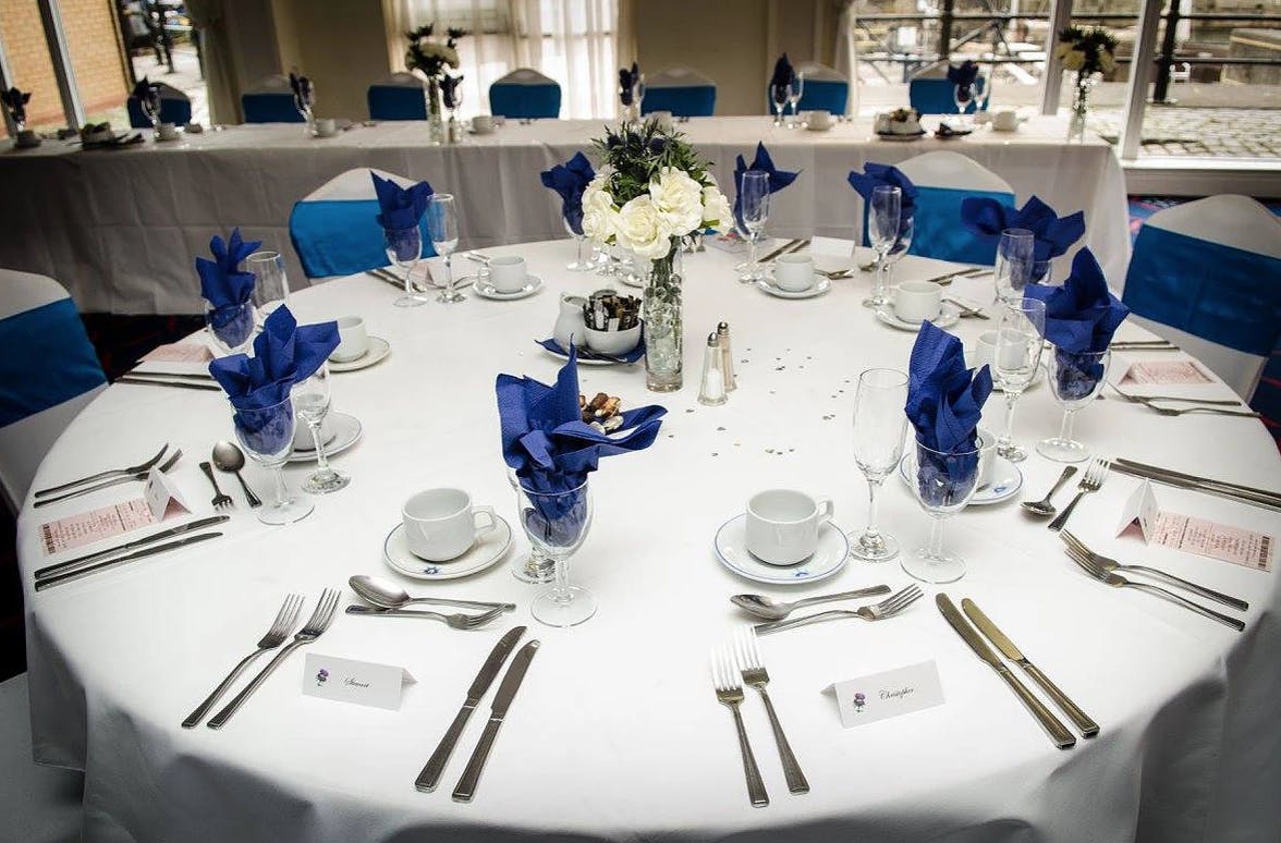 Elegant dining setup at Spinnaker Function Suite for corporate events and celebrations.