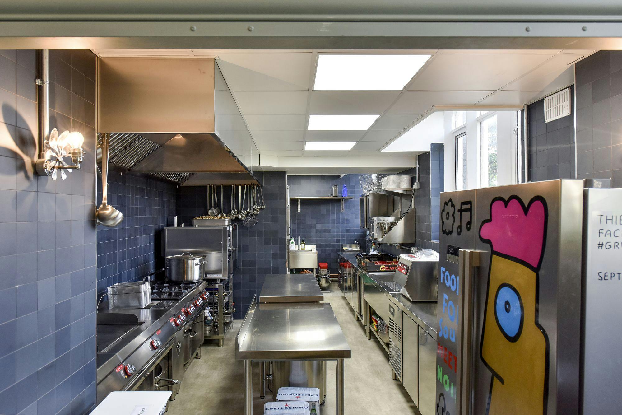 Modern kitchen at Refettorio Felix, St Cuthbert's Centre, ideal for catering events.