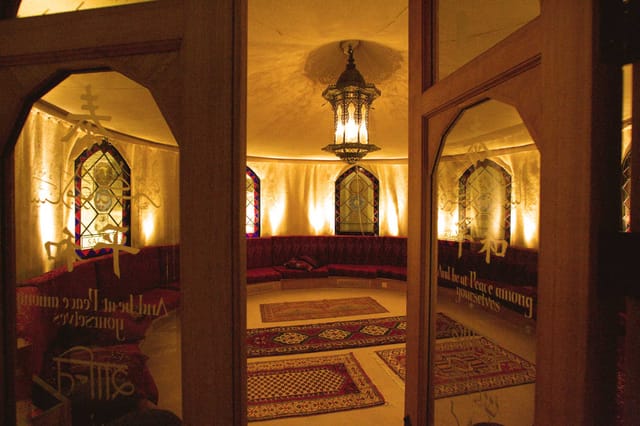 Elegant meeting space at The Tent, circular layout for collaboration, ideal for events.