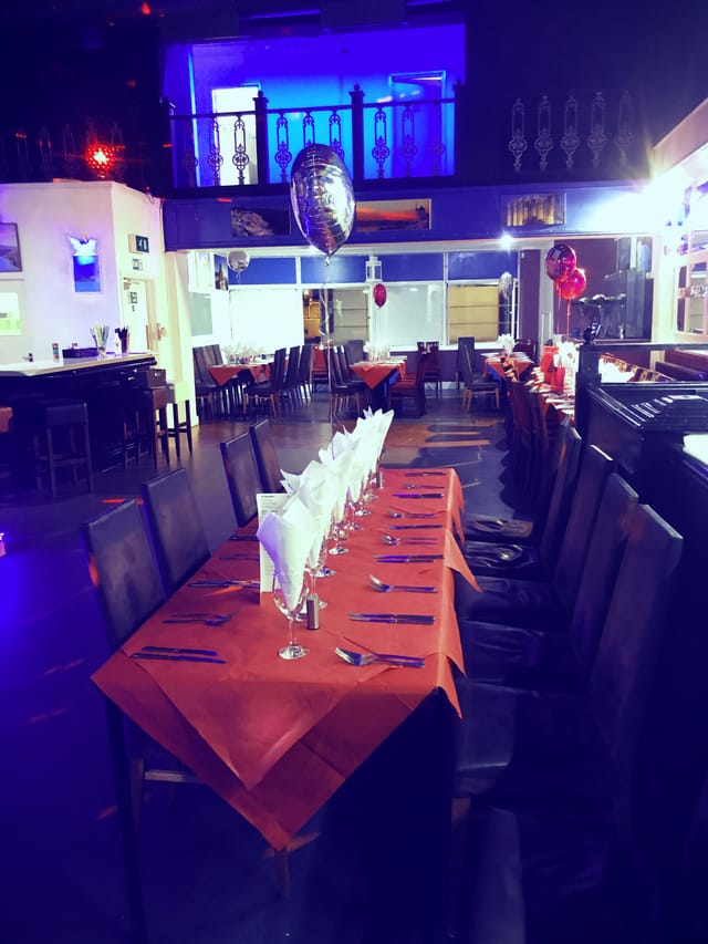 Elegant event space in Santorini Restaurant, set for formal gatherings and celebrations.