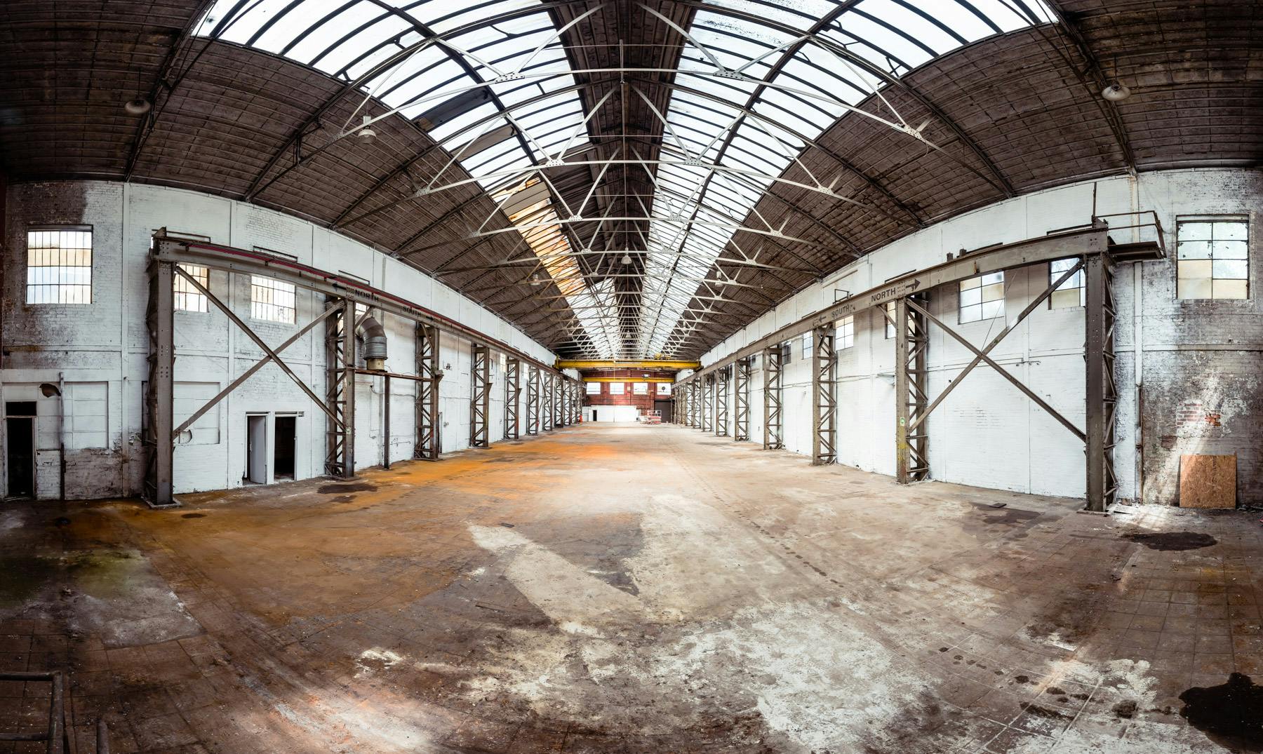 Spacious industrial venue with high ceilings for events at The Rainbow Venues.