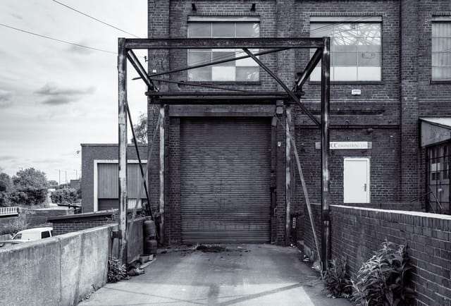 Industrial CRANE venue with brick architecture for creative events and renovations.
