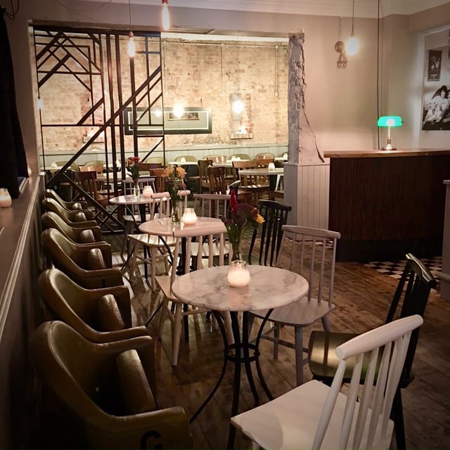 Stylish event space at Dovedale Towers with vintage decor, perfect for gatherings and networking.