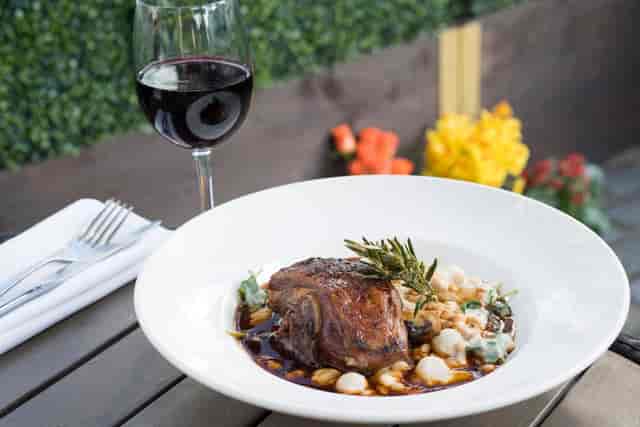 Elegant meat dish with herbs for upscale dining and networking events at Browns Mayfair.