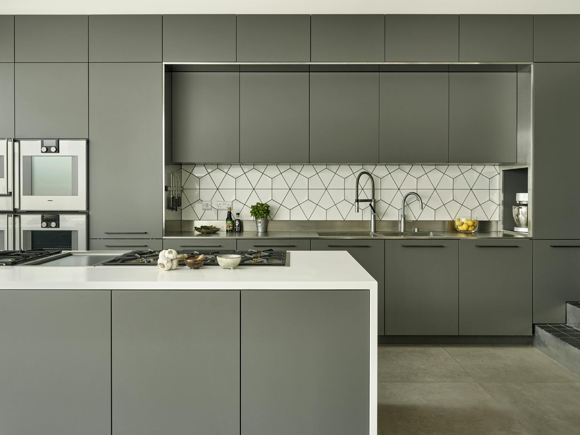 Modern kitchen with sleek cabinetry, perfect for culinary events and cooking workshops.