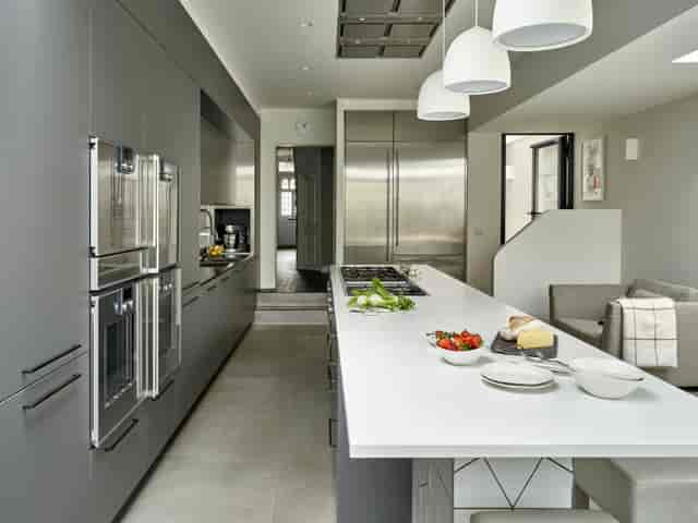 Modern kitchen for culinary events and cooking classes, featuring ample counter space.