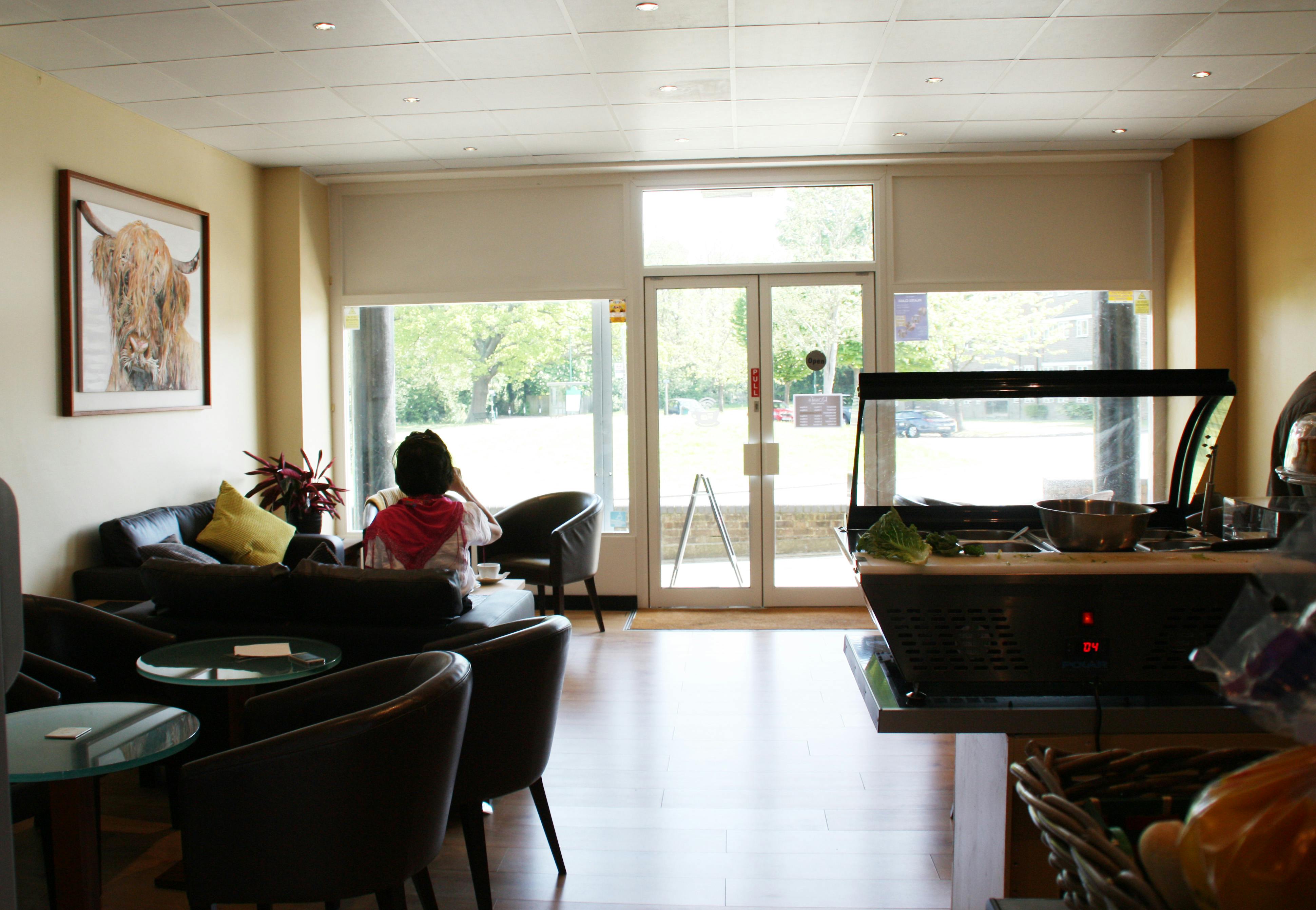 Welcoming lounge at Rossi's Coffee Shop, perfect for networking events and casual meetings.