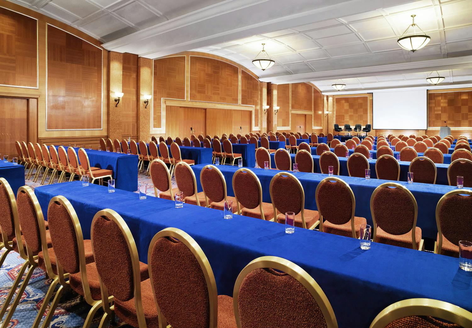 International Suite at Sheraton Skyline Hotel, blue table linens for corporate events.