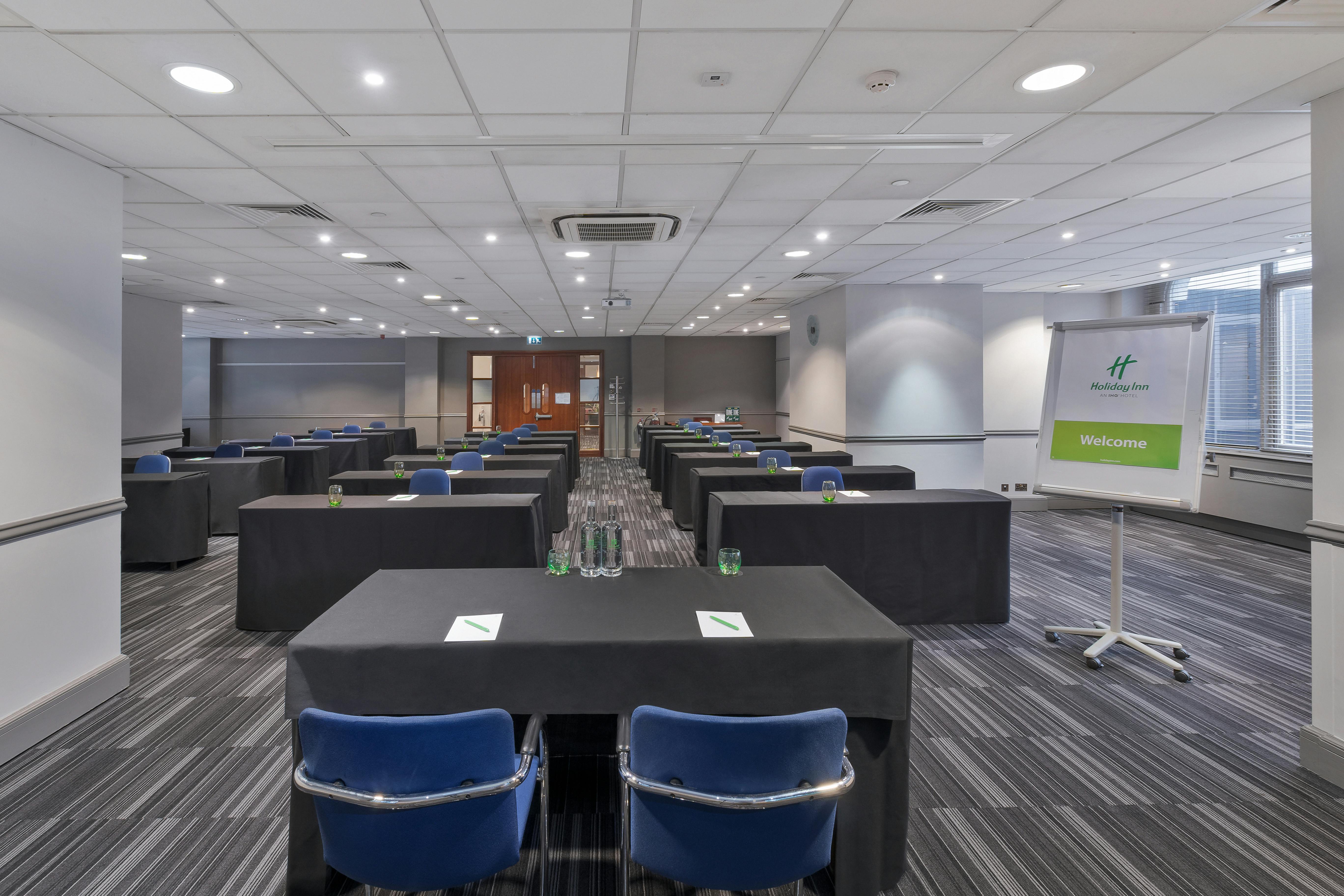 Meeting room setup at Holiday Inn London Kensington for professional events.