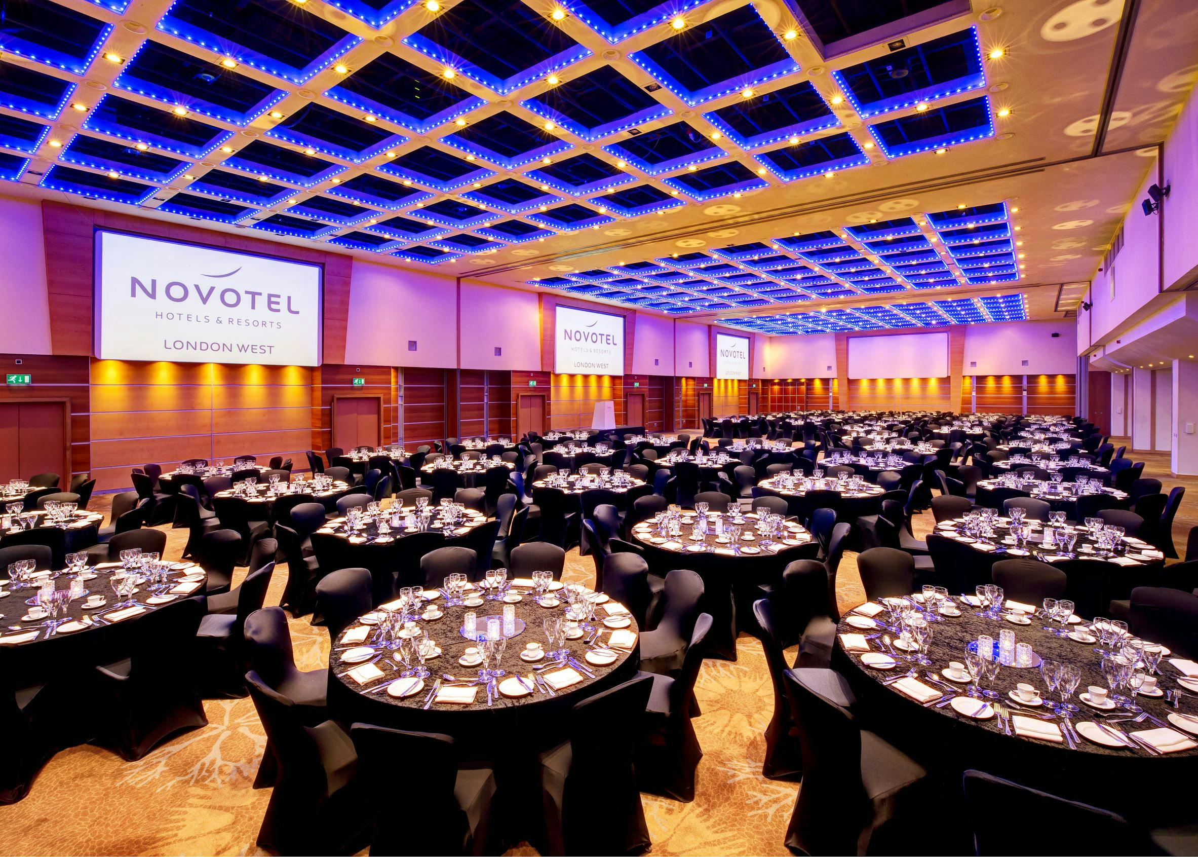 Champagne Suite at Novotel London West, elegant dinner setup for corporate events.