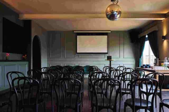 Theater-style event space at The Gallery, The Exhibit Balham for professional meetings and workshops.