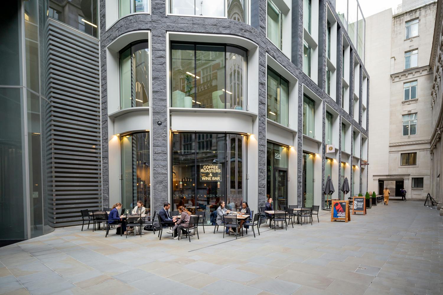 Modern outdoor café in Notes Bank, ideal for networking events and casual meetings.