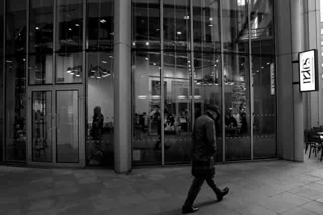 Modern event venue with large glass windows, ideal for corporate functions and social gatherings.