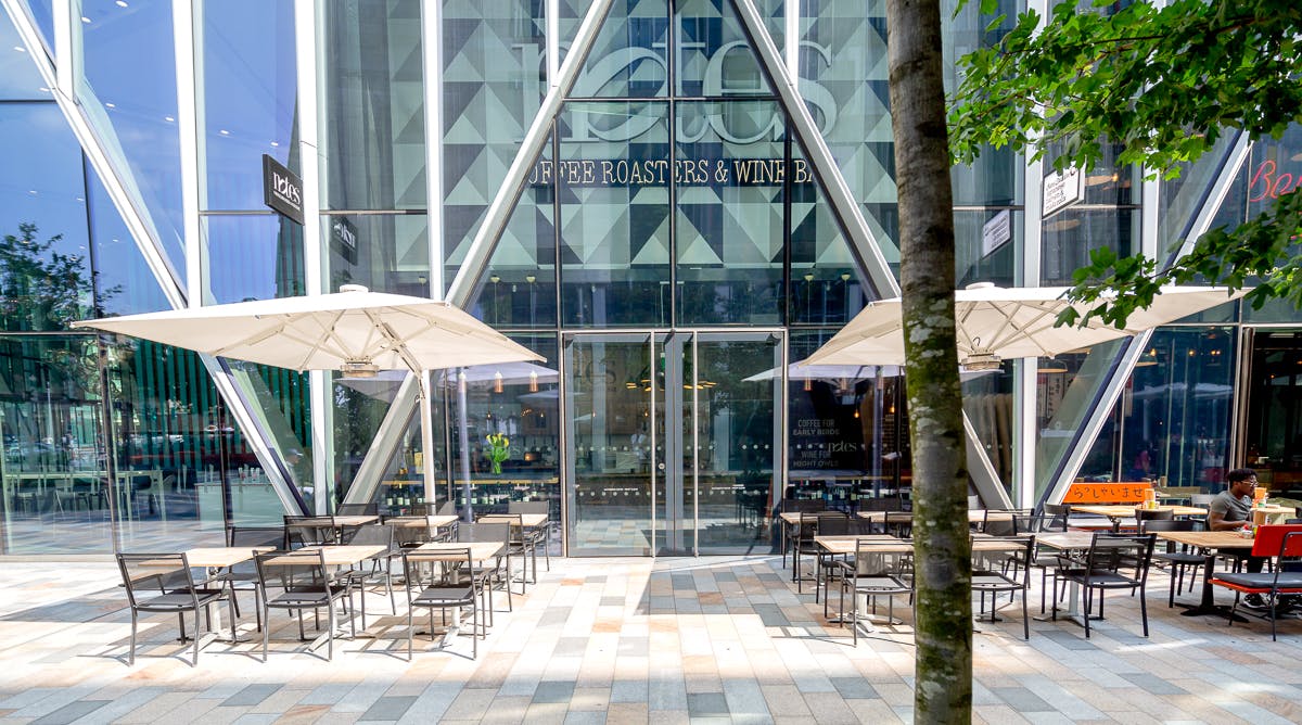 Modern outdoor café at Notes Victoria, ideal for networking events and casual meetings.