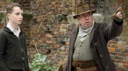 Two people discussing at Nonsuch Mansion, ideal for themed events and immersive experiences.