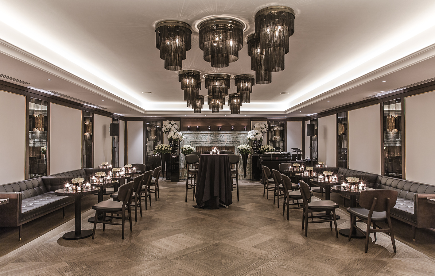 Private dining room at The May Fair Hotel with elegant lighting for upscale events. - Banner