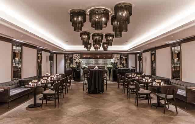 Private dining room at The May Fair Hotel with elegant lighting for upscale events.