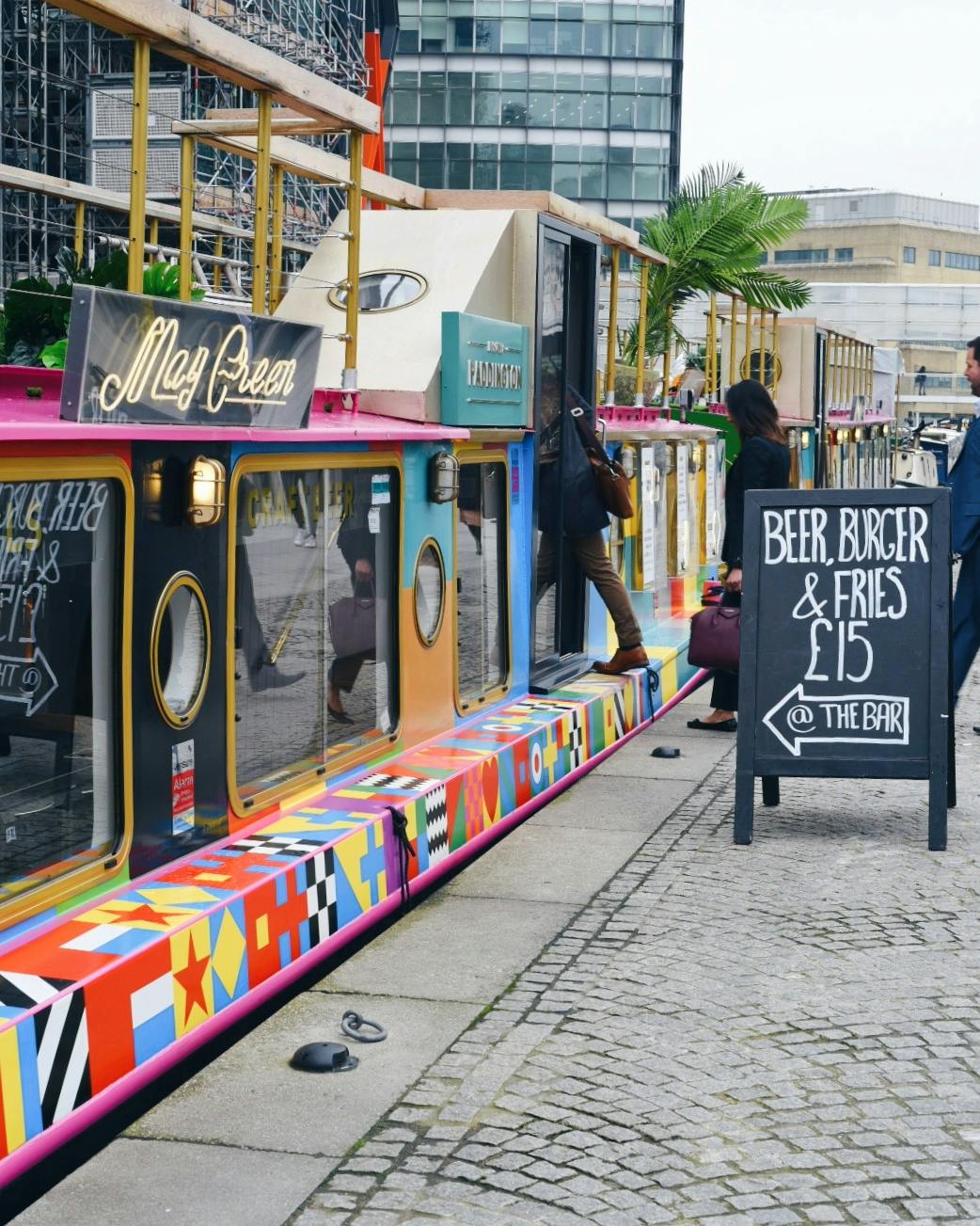 Colorful canal boats at Double Boat Hire, ideal for casual dining and unique events.