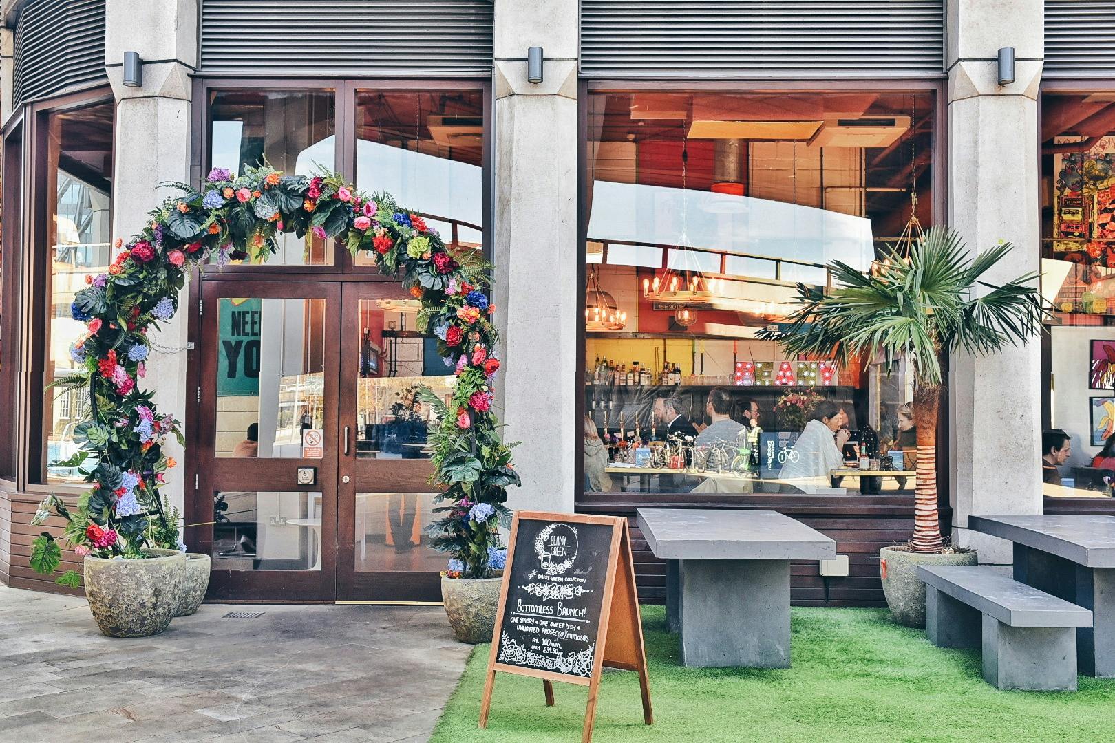 Vibrant floral arch at Beany Green Little Venice venue for events and gatherings.