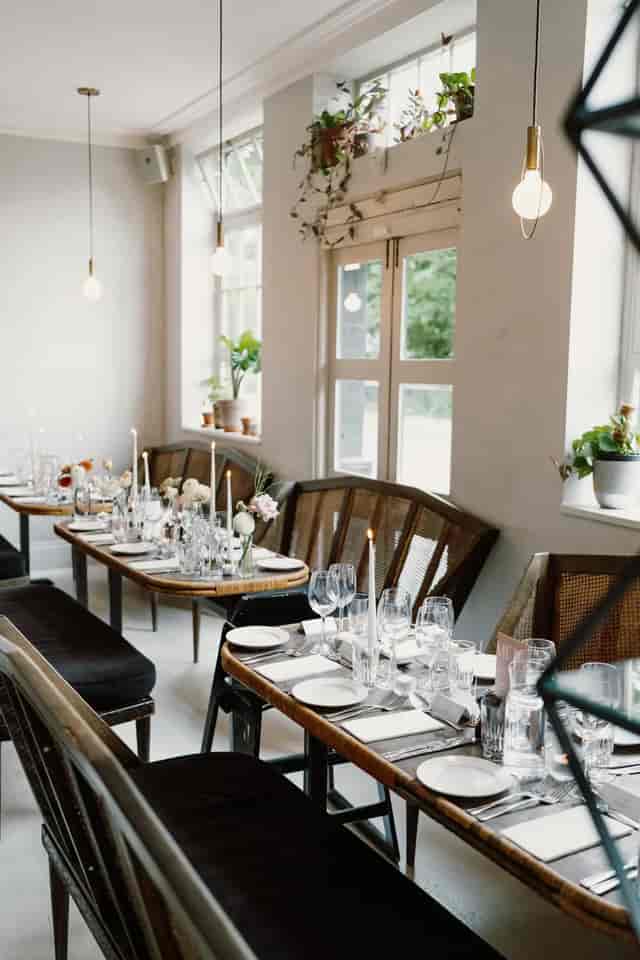 Elegant dining space with floral centerpieces for upscale events and weddings.