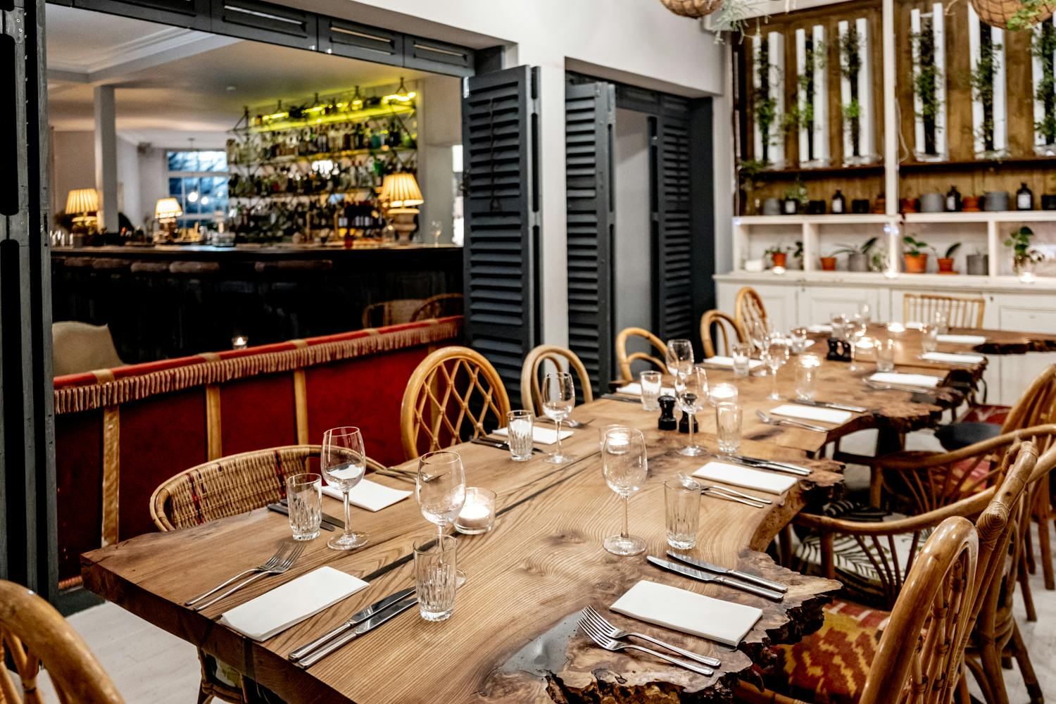 Private dining room with rustic table, ideal for corporate dinners and intimate gatherings.