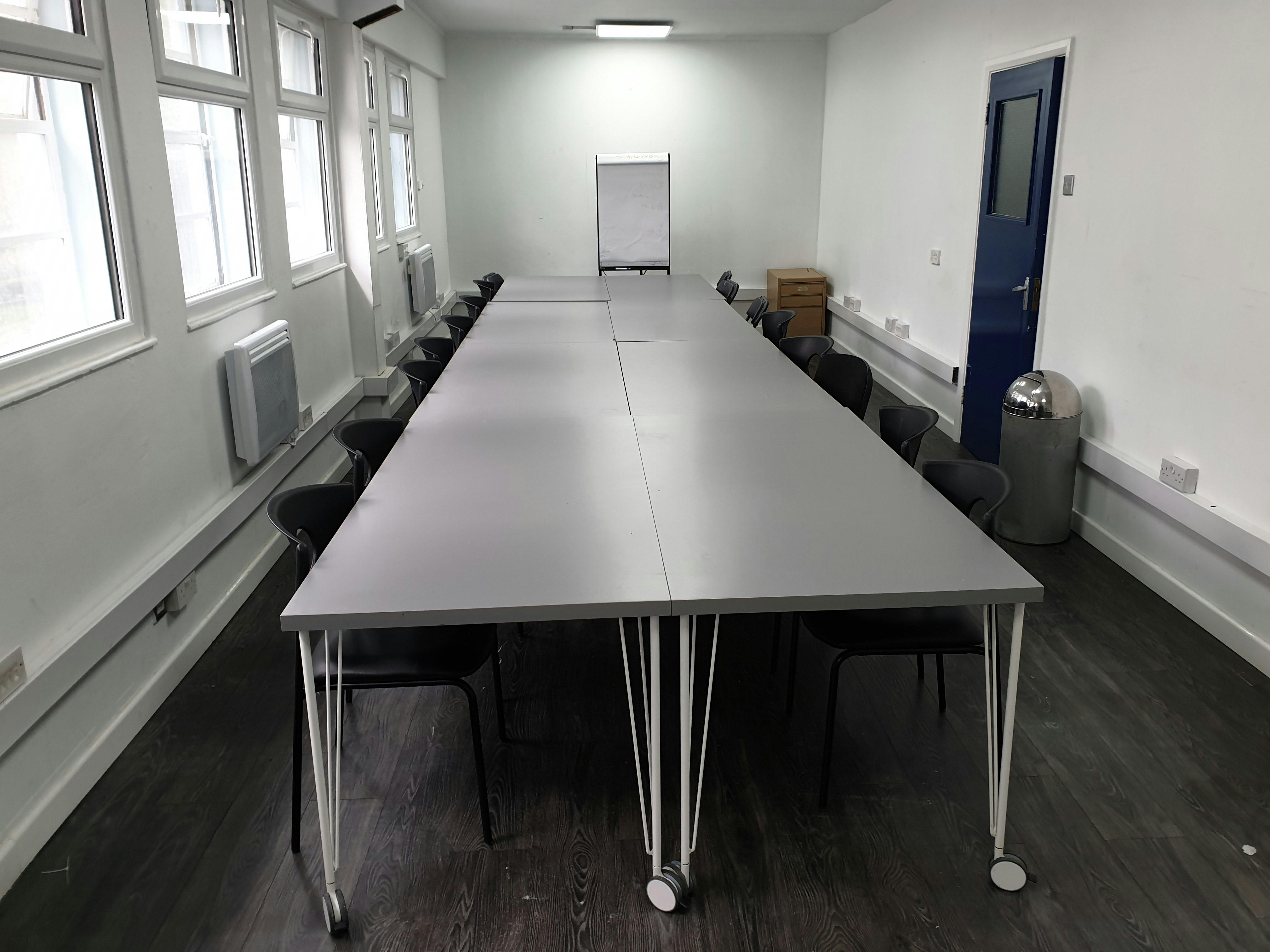 Spacious training room with a long table, ideal for meetings and workshops in Colombo.