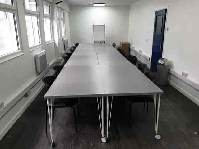 Spacious training room with a long table, ideal for meetings and workshops in Colombo.