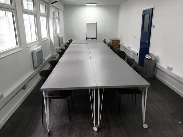 Spacious training room with a long table, ideal for meetings and workshops in Colombo.