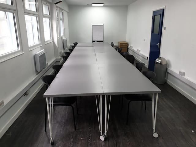 Spacious training room with a long table, ideal for meetings and workshops in Colombo.