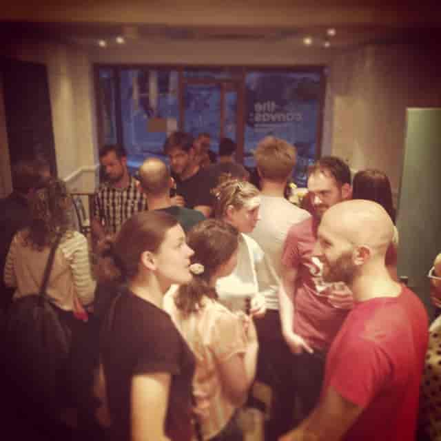 Networking event at Cafe in The Canvas, featuring engaged attendees in a lively atmosphere.
