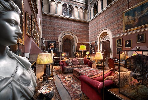 Elegant event space at Eastnor Castle with plush seating for private receptions.