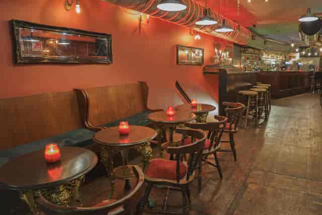 Main Bar at T-Bird with booth seating for networking mixers and corporate happy hours.