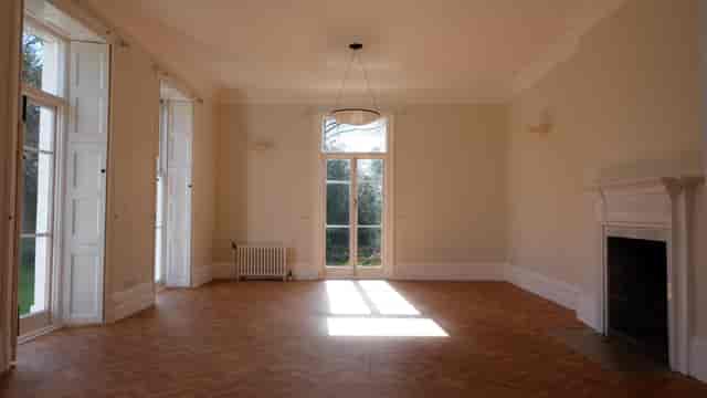 Spacious Thomas Wright room in BELL HOUSE, ideal for meetings and events with large windows.